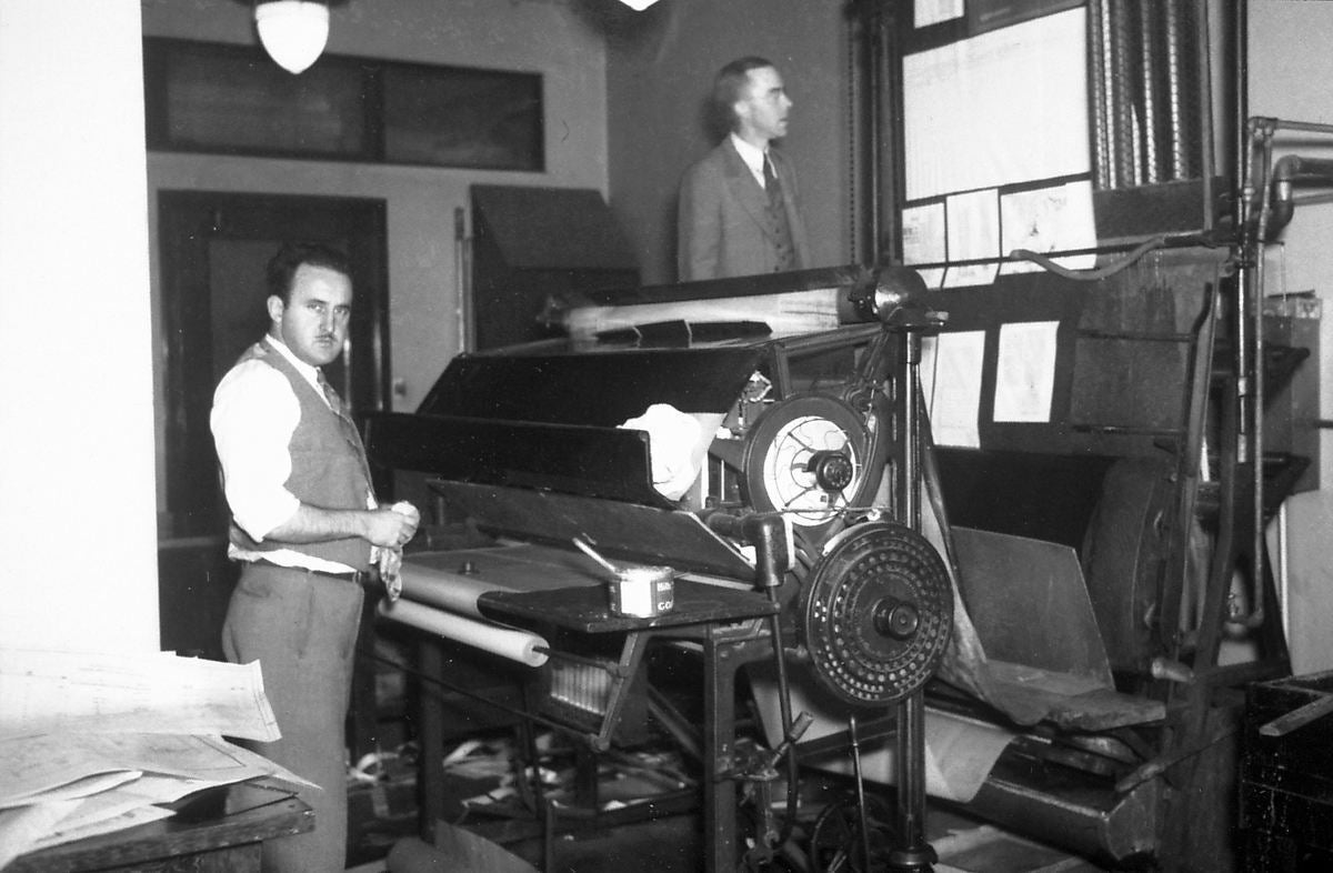 men with printing press c1935 seattle municipal archives via flickr